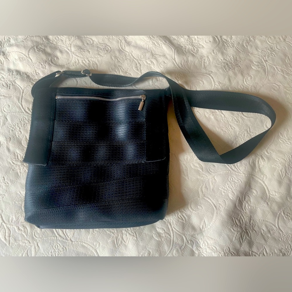 Stina Sayre black seatbelt crossbody purse
